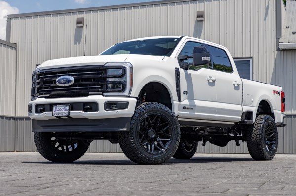 2025 Ford F-350 Super Duty Platinum with a 6" ReadyLift lift kit, 22x12 Fuel Flux wheels, and 37" Nitto Ridge Grappler tires.