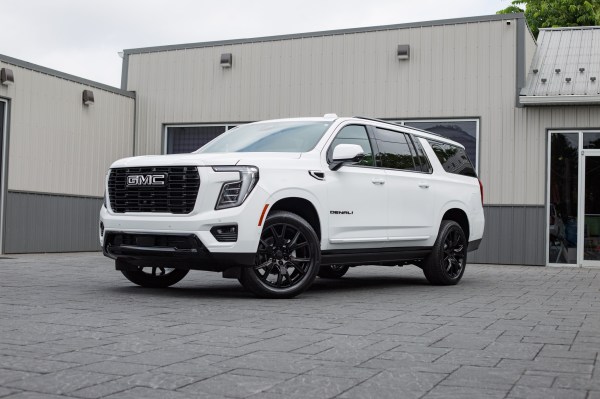 2025 GMC Yukon XL Denali with GMC Factory suspension, 22x9 GMC Stock wheels, and Bridgestone Alenza tires.
