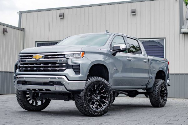 2025 Chevrolet Silverado 1500 LTZ with a 6" Rough Country lift kit, 22x12 Fuel Flame wheels, and 35" Fury Country Hunter R/T tires.