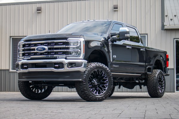2024 Ford F-350 Super Duty XLT with a 6" ReadyLift lift kit, 22x12 Fuel Strike wheels, and 37" Nitto Ridge Grappler tires.