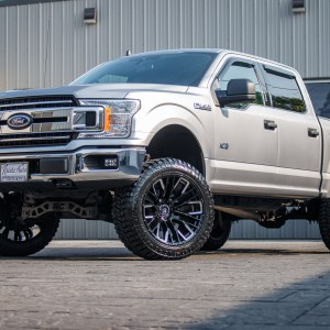 2020 Ford F-150 XLT with a 6" Rough Country lift kit, 22x12 Fuel Rebar wheels, and 35" Avix Trailtek R/T tires.