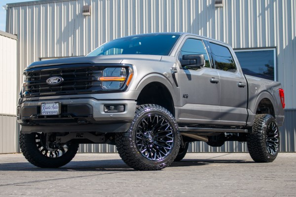 2024 Ford F-150 XLT with a 6" Rough Country lift kit, 22x12 Fuel Strike wheels, and 35" Fury Country Hunter R/T tires.