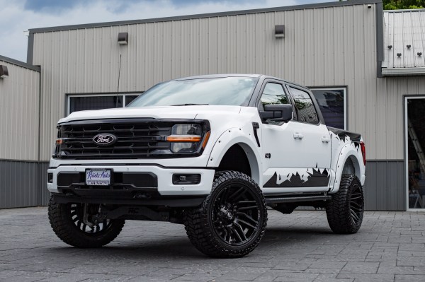 2024 Ford F-150 XLT with a 6" Rough Country lift kit, 22x12 Fuel Typhoon wheels, and 35" Avix Trailtek R/T tires.