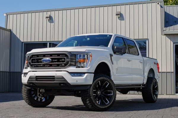2023 Ford F-150 XLT with a 6" Rough Country lift kit, 22x12 Fuel Rebar wheels, and 35" Avix Trailtek R/T tires.