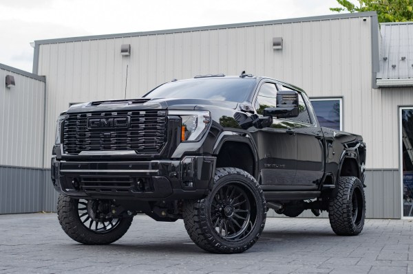 2025 GMC Sierra 3500 Denali Ultimate with a 5" BDS lift kit, 24x12 American Force Notch wheels, and 37" Nitto Ridge Grappler tires.