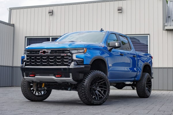 2022 Chevrolet Silverado 1500 ZR2 with a 4" ReadyLift lift kit, 22x12 TIS 554B wheels, and 35" Fury Country Hunter R/T tires.