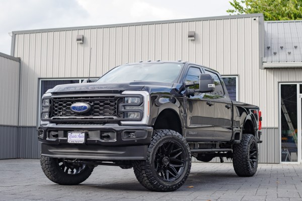 2024 Ford F-250 Super Duty Lariat with a 6" ReadyLift lift kit, 22x12 Fuel Flux wheels, and 37" Nitto Ridge Grappler tires.