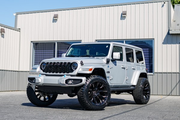 2024 Jeep Wrangler High Altitude 4XE with a 2.5" Rough Country lift kit, 22x12 Fuel Flame wheels, and 35" Fury Country Hunter R/T tires.
