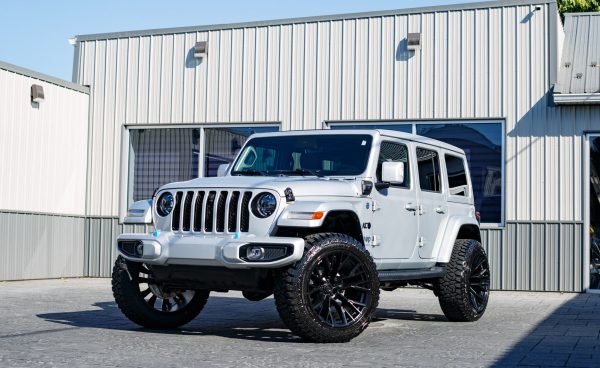2023 Jeep Wrangler Sahara 4XE with a 2.5" Rough Country lift kit, 22x12 Fuel Rebar wheels, and 35" Fury Country Hunter tires.