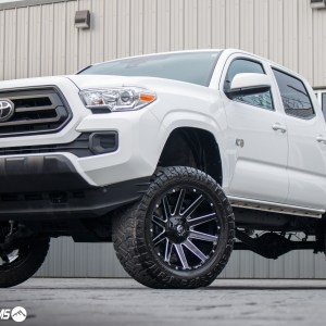 2020 Toyota Tacoma SR5 with a 6" Rough Country lift kit, 20x10 Fuel Contra wheels, and 33" Nitto Ridge Grappler tires.