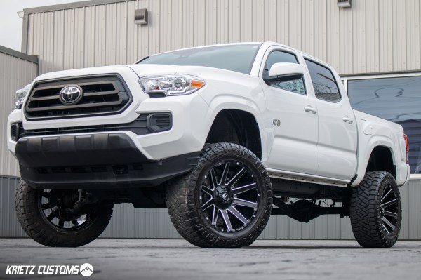 2020 Toyota Tacoma SR5 with a 6" Rough Country lift kit, 20x10 Fuel Contra wheels, and 33" Nitto Ridge Grappler tires.