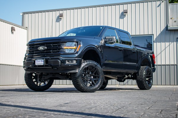 2024 Ford F-150 XLT with a 6" Rough Country lift kit, 22x12 Fuel Flux wheels, and 35" Avix Trailtek R/T tires.