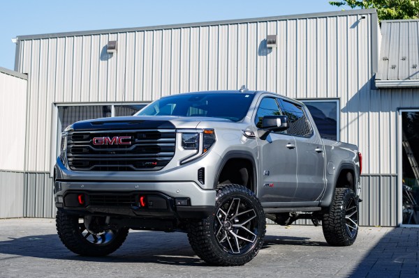 2025 GMC Sierra 1500 AT4 with a 6" Rough Country lift kit, 22x12 Fuel Flux wheels, and 35" Avix Trailtek R/T tires.