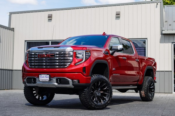 2022 GMC Sierra 1500 Denali with a 6" Rough Country lift kit, 22x12 Fuel Flame wheels, and 35" Nitto Ridge Grappler tires.