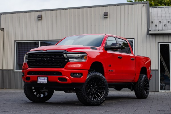 2023 Ram 1500 Big Horn with a 6" Rough Country lift kit, 22x12 Fuel Rebar wheels, and 35" Fury Country Hunter R/T tires.
