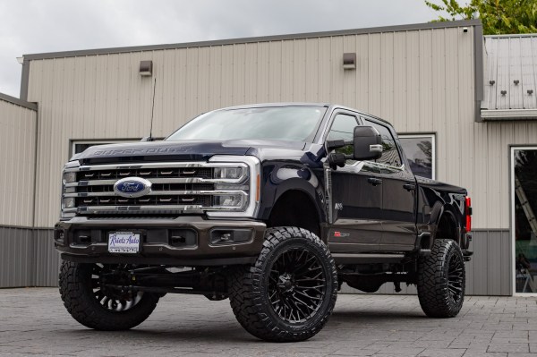 2025 Ford F-350 Super Duty King Ranch with a 6" ReadyLift lift kit, 22x12 Fuel Strike wheels, and 37" Nitto Ridge Grappler tires.