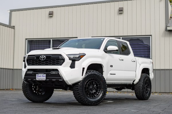 2025 Toyota Tacoma TRD Sport with a 3" ReadyLift lift kit, 18x9 Fuel Revolt wheels, and 35" Avix Trailtek R/T tires.