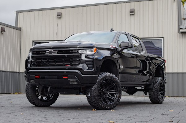 2025 Chevrolet Silverado 1500 LT Trail Boss with a 6" Rough Country lift kit, 22x12 Fuel Brawl wheels, and 35" Fury Country Hunter R/T tires.