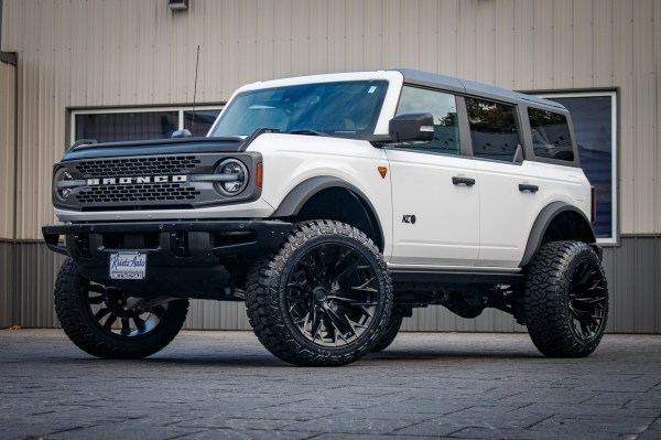 2024 Ford Bronco Badlands with a 3.5" Rough Country lift kit, 22x12 Fuel Flame wheels, and 35" Fury Country Hunter R/T tires.