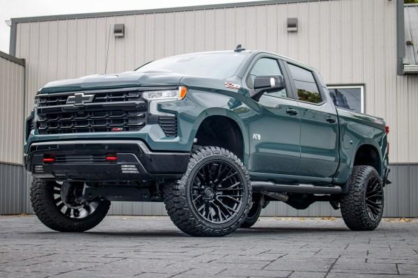 2025 Chevrolet Silverado 1500 LT Trail Boss with a 6" Rough Country lift kit, 22x12 Fuel Rebar wheels, and 35" Avix Trailtek R/T tires.