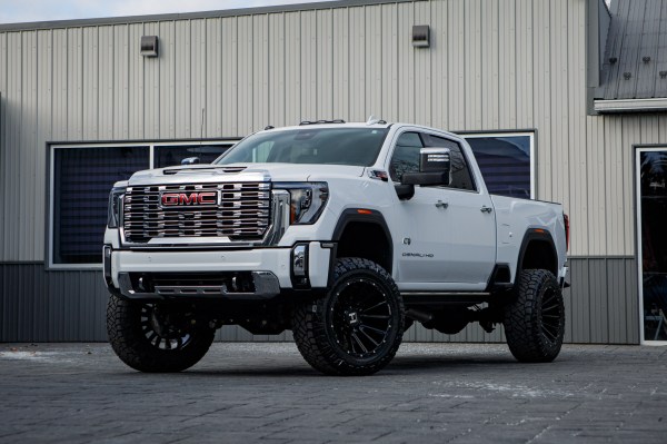 2025 GMC Sierra 3500 with a 5" BDS lift kit, 22x12 Hostile H123 wheels, and 37" Nitto Ridge Grappler tires.