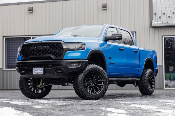 2025 Ram 1500 Rebel with a 6" Rough Country lift kit, 22x12 Fuel Rebar wheels, and 35" Fury Country Hunter R/T tires.