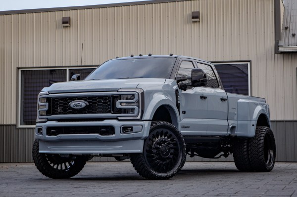 2026 Ford F-450 Platinum with a 4" Wicked lift kit, 26x8.25 American Force Riptide wheels, and 37" AMP Terrain Attack M/T A tires.