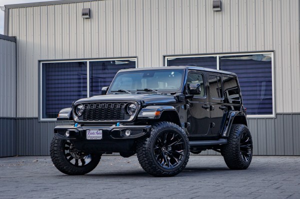 2024 Jeep Wrangler High Altitude 4XE with a 2.5" Rough Country lift kit, 22x12 Fuel Flame wheels, and 35" Fury Country Hunter R/T tires.