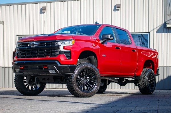 2025 Chevrolet Silverado 1500 LT Trail Boss with a 6" Rough Country lift kit, 22x12 Fuel Rebar wheels, and 35" Fury Country Hunter R/T tires.