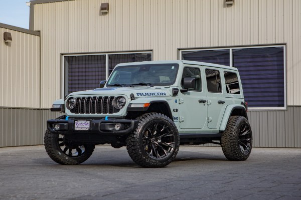 2024 Jeep Wrangler Rubicon 4XE with Jeep Stock suspension, 22x12 Fuel Flame wheels, and 35" Fury Country Hunter R/T tires.
