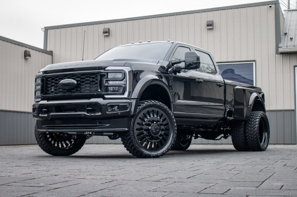 2025 Ford F-450 Super Duty Platinum with a Wicked 4" lift kit, 26x8.25 American Force Massive wheels, and 37" AMP Terrain Attack tires.